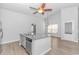 Open kitchen with island, stainless steel appliances, and granite countertops at 4348 Livorn Loop # 4348, Myrtle Beach, SC 29579