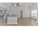 Eat-in kitchen with island, granite countertops, and hardwood floors at 4348 Livorn Loop # 4348, Myrtle Beach, SC 29579