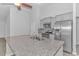 Kitchen island with granite countertop and stainless steel sink at 4348 Livorn Loop # 4348, Myrtle Beach, SC 29579