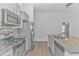 Modern kitchen featuring stainless steel appliances and granite countertops at 4348 Livorn Loop # 4348, Myrtle Beach, SC 29579
