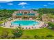 Community pool with expansive deck and clubhouse at 4348 Livorn Loop # 4348, Myrtle Beach, SC 29579