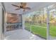 Spacious screened porch overlooking a backyard with lush green grass at 4348 Livorn Loop # 4348, Myrtle Beach, SC 29579
