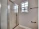 Bathroom with shower stall and window at 4417 N Plantation Harbour Dr. # B, Little River, SC 29566