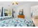 Bedroom with two twin beds, dresser, and access to hallway at 4533 Girvan Dr. # D, Myrtle Beach, SC 29579