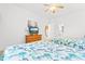 Comfortable bedroom with twin beds, dresser, and view of kitchen at 4533 Girvan Dr. # D, Myrtle Beach, SC 29579