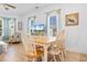Casual dining area with a wood table and white chairs at 4533 Girvan Dr. # D, Myrtle Beach, SC 29579