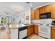 Open kitchen with breakfast bar, overlooking the living room at 4533 Girvan Dr. # D, Myrtle Beach, SC 29579