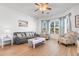 Spacious living room with hardwood floors, bay window, and comfortable seating at 4533 Girvan Dr. # D, Myrtle Beach, SC 29579
