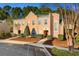 Exterior view of a charming three-unit townhouse building at 4533 Girvan Dr. # D, Myrtle Beach, SC 29579