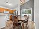 Dining area with wood table and chairs, adjacent to kitchen at 4600 Hidden Creek Ln., Myrtle Beach, SC 29579