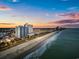 Aerial view of beachfront property with ocean, beach, and high-rise buildings at 504 N Ocean Blvd. # 1511, Myrtle Beach, SC 29577