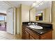 Clean bathroom with vanity and a view of the kitchen at 504 N Ocean Blvd. # 1511, Myrtle Beach, SC 29577