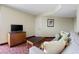 Living room with sofa, coffee table, and TV at 504 N Ocean Blvd. # 1511, Myrtle Beach, SC 29577