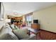 Living room with sofa, TV, dining table and access to balcony at 504 N Ocean Blvd. # 1511, Myrtle Beach, SC 29577