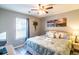 King size bed and large window with blinds at 562 Blue Stem Dr. # 54D, Pawleys Island, SC 29585