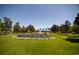 Community clubhouse with fountain and landscaping at 562 Blue Stem Dr. # 54D, Pawleys Island, SC 29585