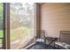 Screened porch with outdoor seating at 562 Blue Stem Dr. # 54D, Pawleys Island, SC 29585
