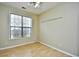 Well-lit bedroom with ceiling fan and laminate floors at 5703 Coquina Point Dr., North Myrtle Beach, SC 29582