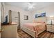 Bedroom with a bed, dresser and ocean themed decor at 6001 - B-4 S Kings Hwy., Myrtle Beach, SC 29575