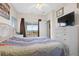 Bedroom with ocean view, comfy bed, and dresser at 6001 - B-4 S Kings Hwy., Myrtle Beach, SC 29575