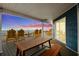 Oceanfront deck with picnic table and chairs, offering stunning sunset views at 6001 - B-4 S Kings Hwy., Myrtle Beach, SC 29575