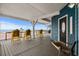 Beachfront deck with yellow chairs and ocean views at 6001 - B-4 S Kings Hwy., Myrtle Beach, SC 29575