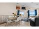 Open dining area with ocean view and glass top table at 6001 - B-4 S Kings Hwy., Myrtle Beach, SC 29575