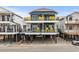Two-story beach home with ocean views and multiple balconies at 6001 - B-4 S Kings Hwy., Myrtle Beach, SC 29575