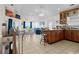 Open kitchen with island, dining area, and ocean view at 6001 - B-4 S Kings Hwy., Myrtle Beach, SC 29575