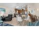 Open concept kitchen and dining area with wood cabinets and breakfast bar at 6001 - B-4 S Kings Hwy., Myrtle Beach, SC 29575
