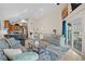 Bright living room with ocean view, comfy sofas, and access to deck at 6001 - B-4 S Kings Hwy., Myrtle Beach, SC 29575