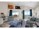 Spacious living room with ocean view and access to deck at 6001 - B-4 S Kings Hwy., Myrtle Beach, SC 29575