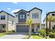 Two-story home with gray accents and landscaping at 6760 Ocean Breeze Loop, Myrtle Beach, SC 29572