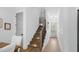 Modern staircase with hardwood steps and railing at 6760 Ocean Breeze Loop, Myrtle Beach, SC 29572