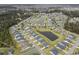 Aerial view of the community showcasing ponds, well-maintained lawns, and neatly arranged homes at 688 Tattlesbury Dr., Conway, SC 29526