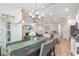 Bright open floorplan with dining area leading into the modern kitchen and living room at 688 Tattlesbury Dr., Conway, SC 29526