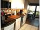 Modern kitchen with granite countertops and stainless steel appliances at 6900 N Ocean Blvd. # 111, Myrtle Beach, SC 29572