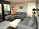 Living room with sectional sofa and ocean view at 6900 N Ocean Blvd. # 111, Myrtle Beach, SC 29572