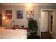Main bedroom with king-size bed and bicycle at 6900 N Ocean Blvd. # 111, Myrtle Beach, SC 29572