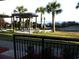 Relaxing patio area with pergola and ocean views at 6900 N Ocean Blvd. # 111, Myrtle Beach, SC 29572