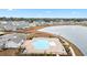 Community pool and clubhouse with lake and neighborhood view at 763 Eastridge Dr., Conway, SC 29526