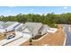 Aerial view of a tan house with a yard and driveway at 763 Eastridge Dr., Conway, SC 29526