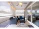 Relaxing screened porch with seating at 763 Eastridge Dr., Conway, SC 29526