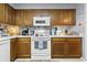 Well-equipped kitchen featuring ample cabinetry and modern appliances at 825 Colony Dr., Murrells Inlet, SC 29576