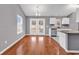 Dining area with hardwood floors, gray walls and french doors leading to the backyard at 8251 Tartan Ln., Myrtle Beach, SC 29588