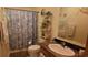 Bathroom with seashell decor, shower, and vanity at 8947 Alexander Ct., Myrtle Beach, SC 29588