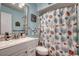Clean bathroom with a shower/tub combo and beachy decor at 9661 Shore Dr. # 4B-15, Myrtle Beach, SC 29572
