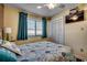 Bedroom with a TV, closet, and beach decor at 9661 Shore Dr. # 4B-15, Myrtle Beach, SC 29572