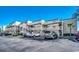 Ocean Bridge building exterior with parking lot at 9661 Shore Dr. # 4B-15, Myrtle Beach, SC 29572