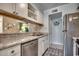 Kitchen with stainless steel appliances and light cabinets at 9661 Shore Dr. # 4B-15, Myrtle Beach, SC 29572